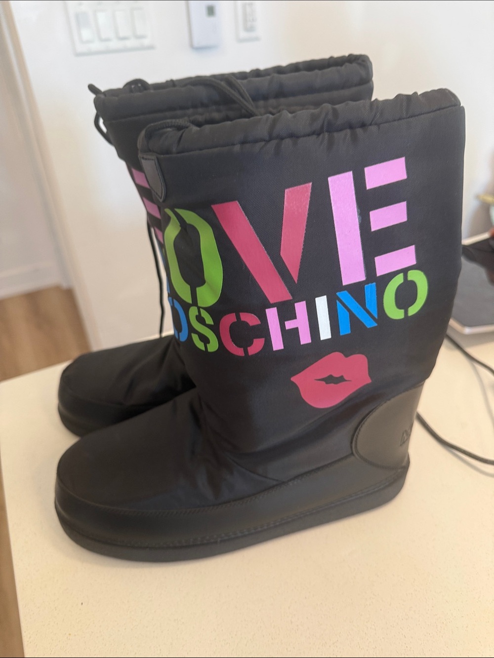 Moschino Black Puffer Boots with Multicolor Logo and Pink Lips